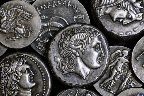 Photography Coin with Alexander the Great portrait and Ancient Greek silver metal money, pattern of vintage coins for texture background