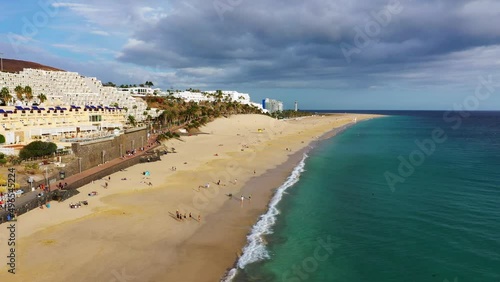 Wallpaper Mural Aerial view of beach in Morro del Jable town (Morro Jable beach) on Fuerteventura island, Canary Islands, Spain. One of the best beach in the Canaries. Motorral lighthouse in distance. Torontodigital.ca
