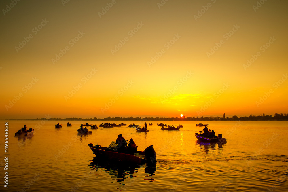 A lot of fishing boats on sunrise