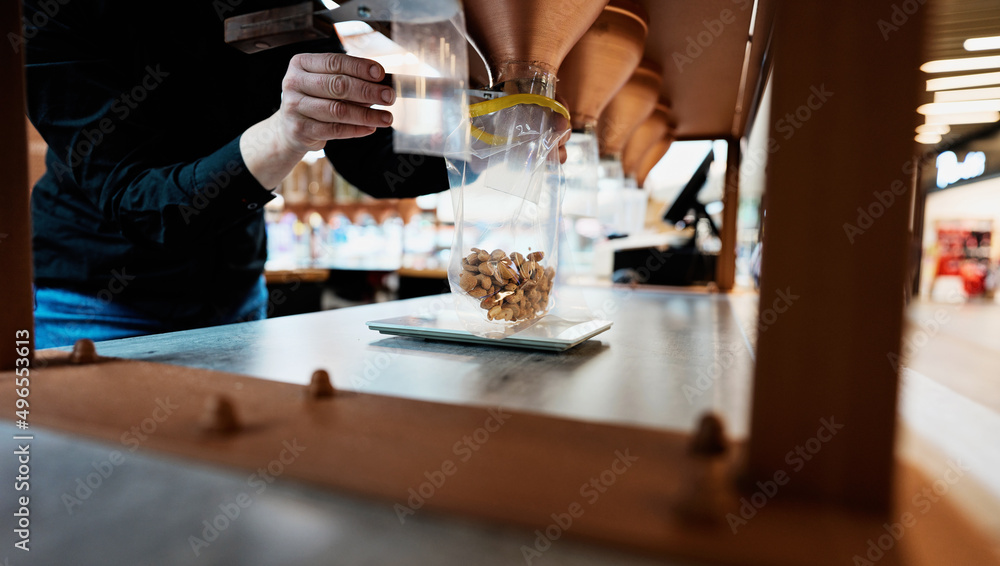 Delicious freshly backed and roasted nuts and seeds. Healthy vegan and vegetarian food shop concept. Delicious freshly backed and roasted nuts and seeds. Healthy vegan and vegetarian food shop concept.