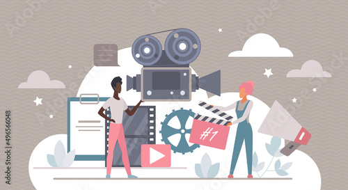 Cinema production vector illustration. Cartoon professional team of tiny people holding clapperboard and camera, filmmaking. Entertainment industry, video film making process in studio concept