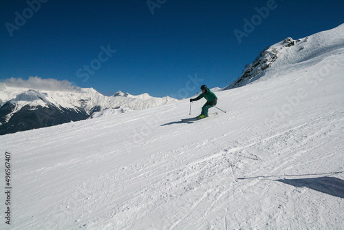 A skier on the slopes of a ski resort, Sochi, Russia.