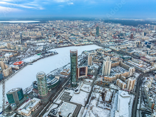 Yekaterinburg aerial panoramic view in Winter at sunset. Yekaterinburg city and pond in winter. © Dmitrii Potashkin
