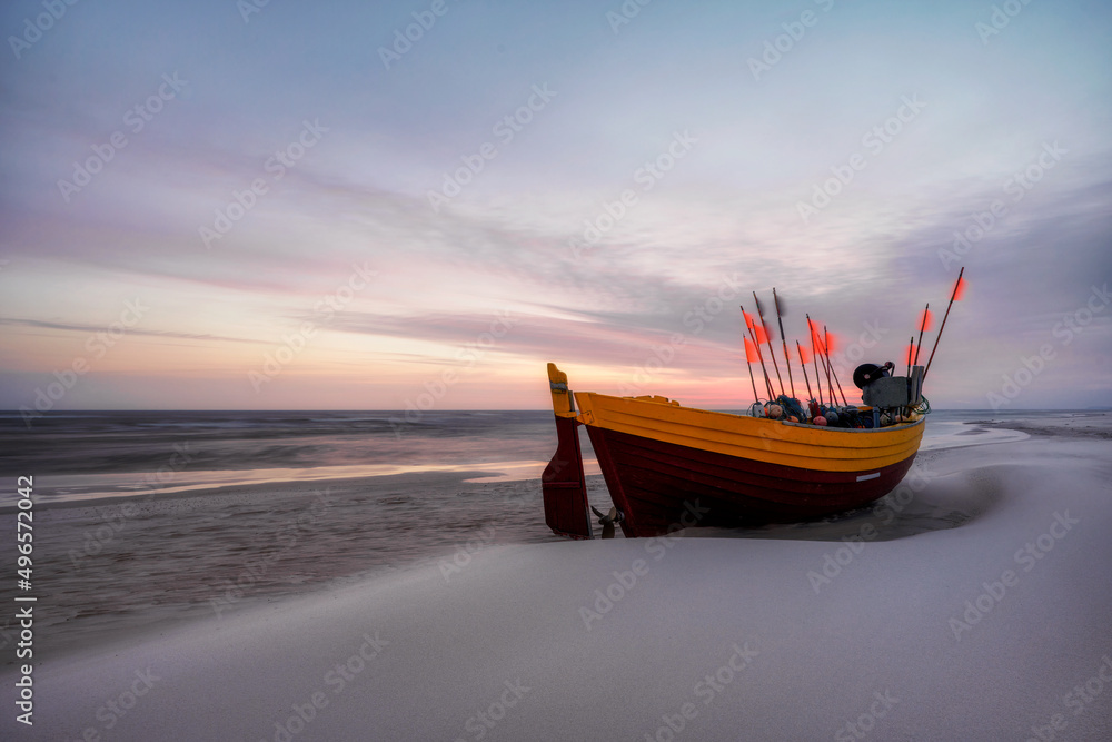 Debki, Polish famous beach on the Baltic Sea, in the photo a fishing boat Debki, Polish famous beach on the Baltic Sea, in the photo a fishing boat