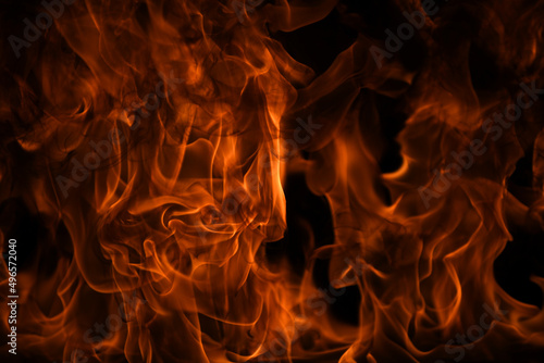 Texture of fire on a black background. Abstract fire flame background, large burning fire.