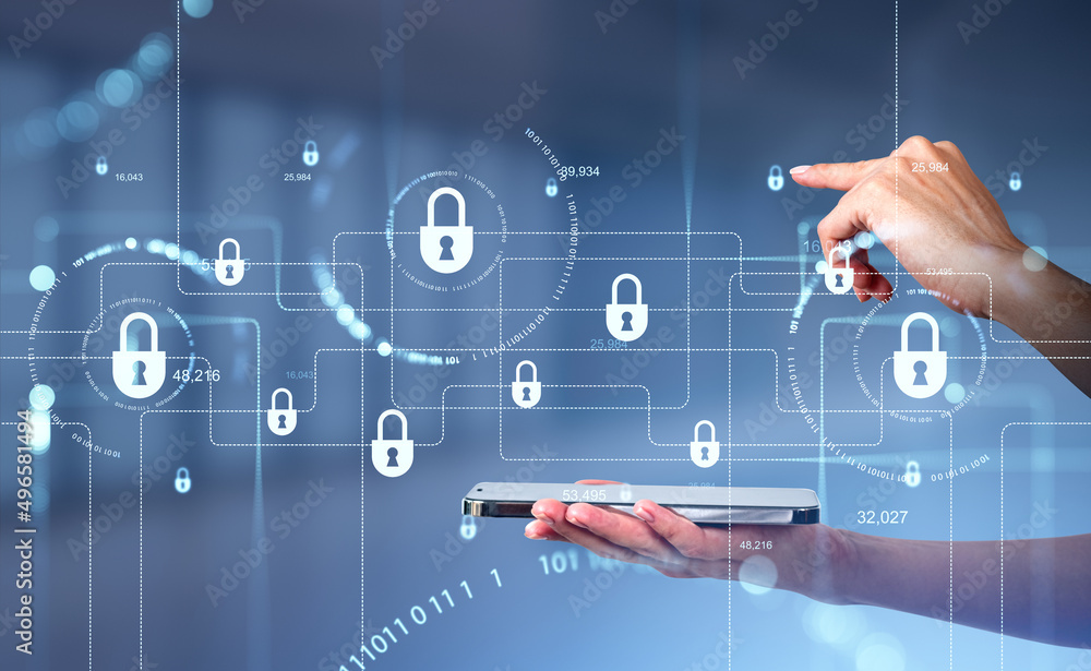 Businesswoman is holding smartphone and touching digital interface with padlocks Businesswoman is holding smartphone and touching digital interface with padlocks