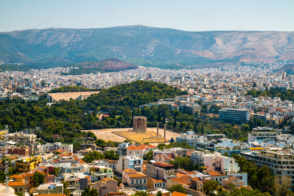 Panoramic view on Athens from Acropolis with Temple Columns of Olympian Zeus, Olympieion and mount Hymettus in the background