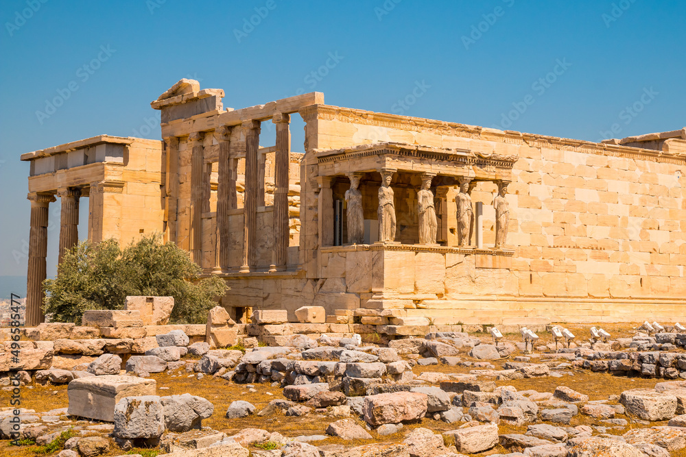 Erechtheion or Temple of Athena Polias with caryatid, sculpted female statue serving as an architectural support the porch of the Maidens