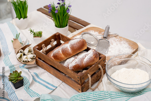 bread on the table decor of flowers and fabric