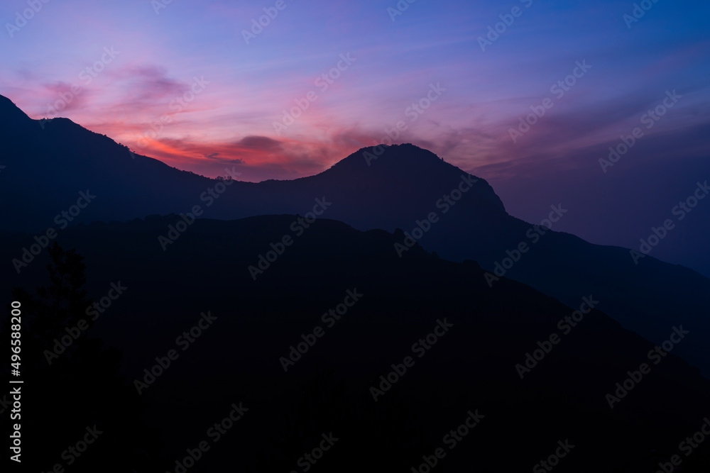 Dramatic sunrise sky with beautiful mountain view