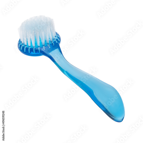 Brush for cleaning the house, washing dishes and cleaning clothes on a white isolated background.