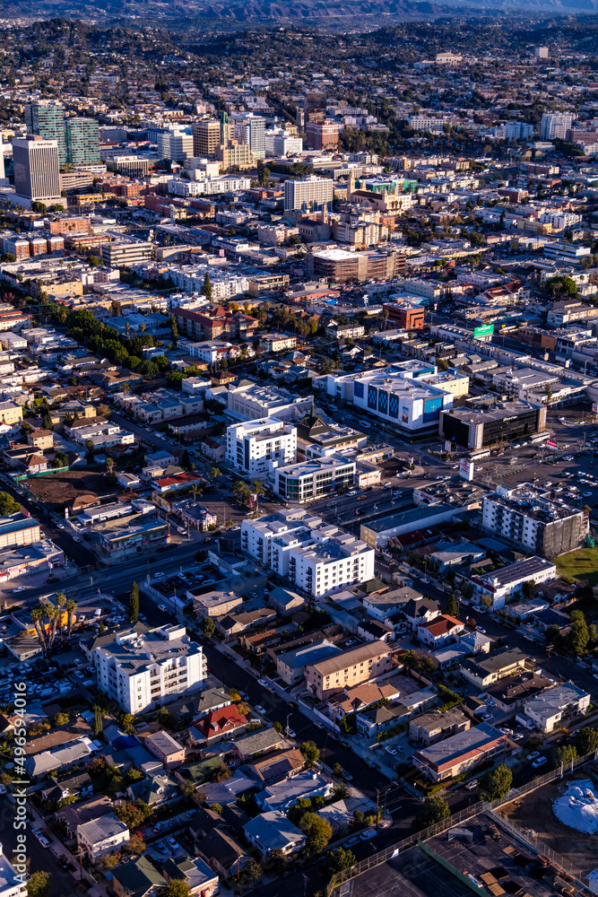 Aerial of sunny Los Angeles modern city suburbs