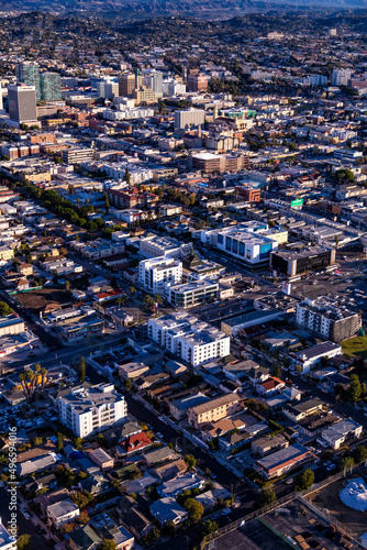 Aerial of sunny Los Angeles modern city suburbs