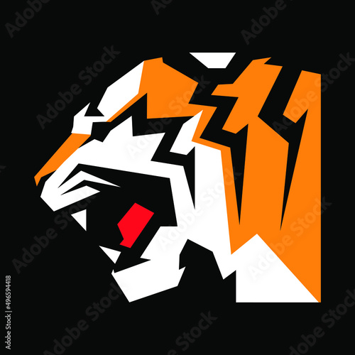 Tiger side view portrait symbol on black backdrop. Design element