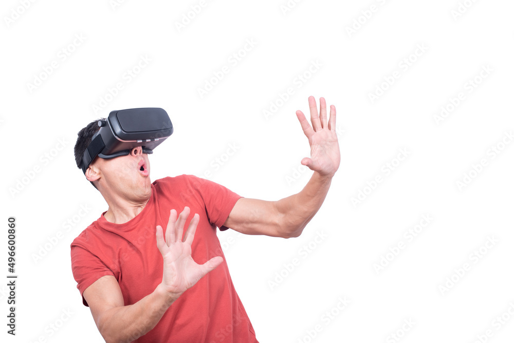 Amazed man in exploring virtual reality in VR glasses Amazed man in exploring virtual reality in VR glasses