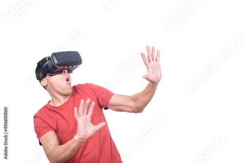 Amazed man in exploring virtual reality in VR glasses