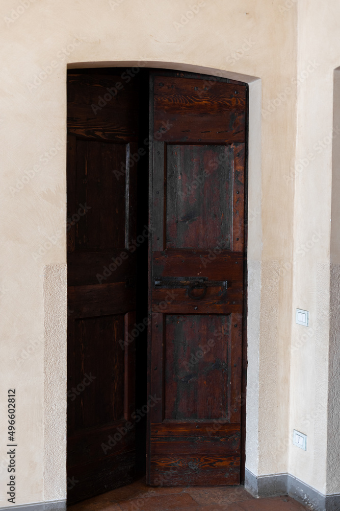old wooden door in european historical architecture building
