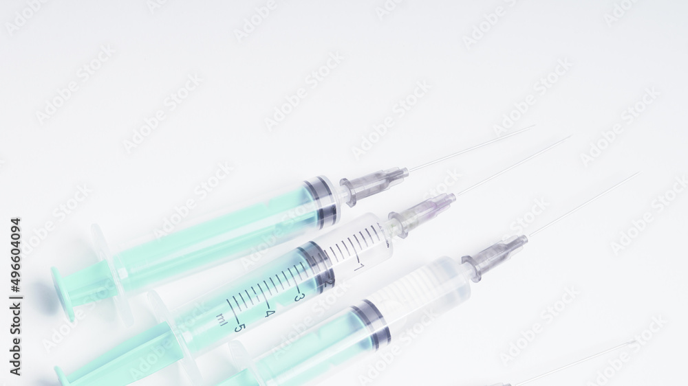 medical disposable plastic syringe for injection in the hospital isolated on a white background medical disposable plastic syringe for injection in the hospital isolated on a white background