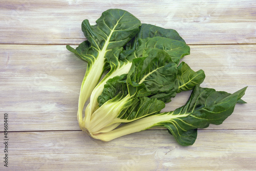 Balkan cuisine. Blitva ( chard leaves ) - popular leafy vegetables. Rustic table, free space for text