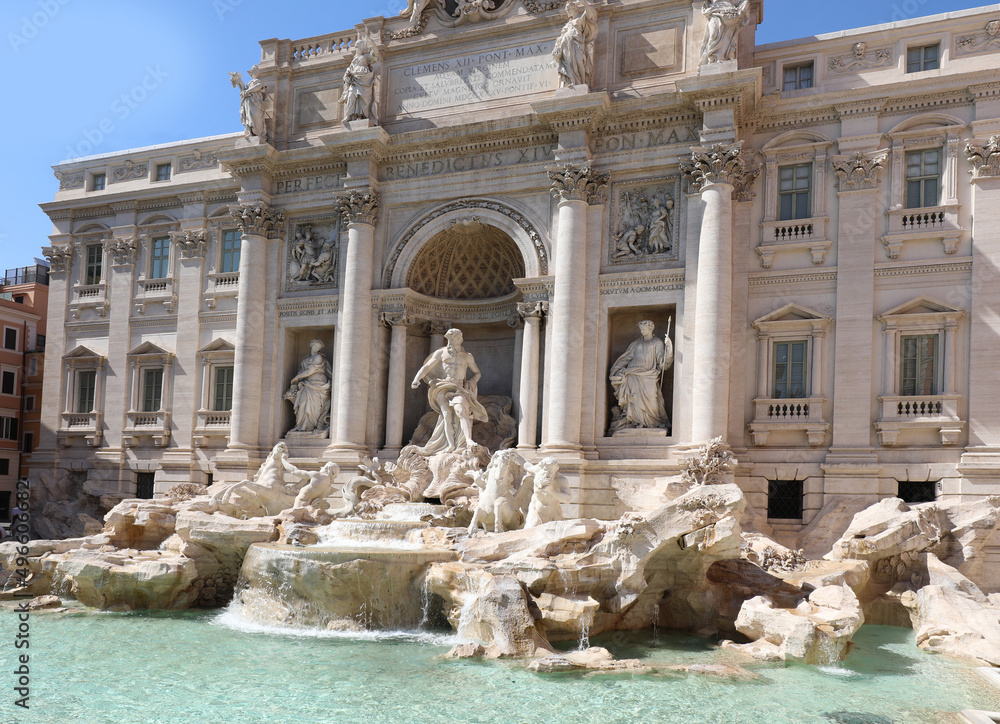 God Neptune and other statues in the fountain called Trevi FONTANA in the center of Rome without people