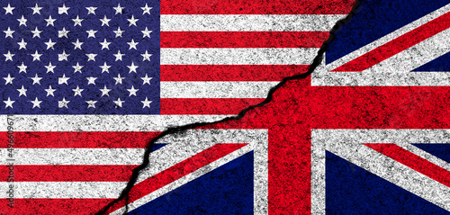 USA and United Kingdom. Flags painted on cracked concrete wall. United States, America. Partnership, relationships and conflict concept. Banner background photo