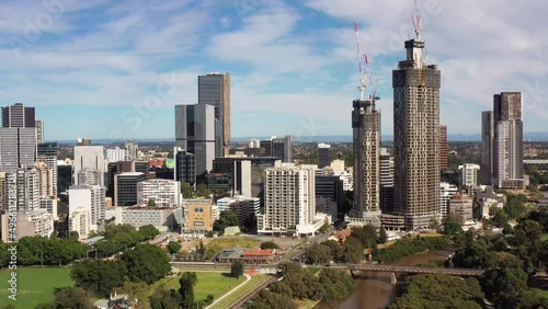 Backward aerial flying from towers of Parramatta city CBD in West Sydney 4k.
 photo