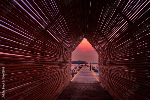 Beautiful bamboo tunnel in the sunset in Samae San Island, Samaesarn, Sattahip District, Chon Buri, Thailand photo
