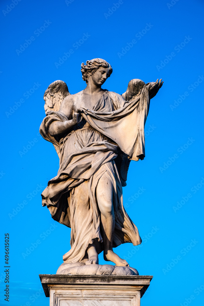 Angel with the Sudarium Veronica Veil statue by Cosimo Fancelli on Ponte Sant'Angelo Saint Angel Bridge over Tiber river in historic center of Rome in Italy