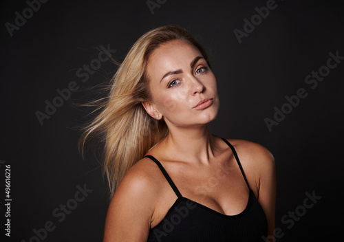 Wallpaper Mural Beautiful attractive blonde body positive Caucasian woman in black bra posing against dark background with copy ad space. Confidence, self acceptance, healthy lifestyle. Love your body concept Torontodigital.ca