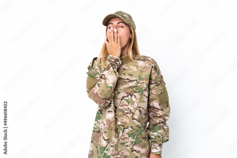 Military woman isolated on white background yawning and covering wide open mouth with hand Military woman isolated on white background yawning and covering wide open mouth with hand