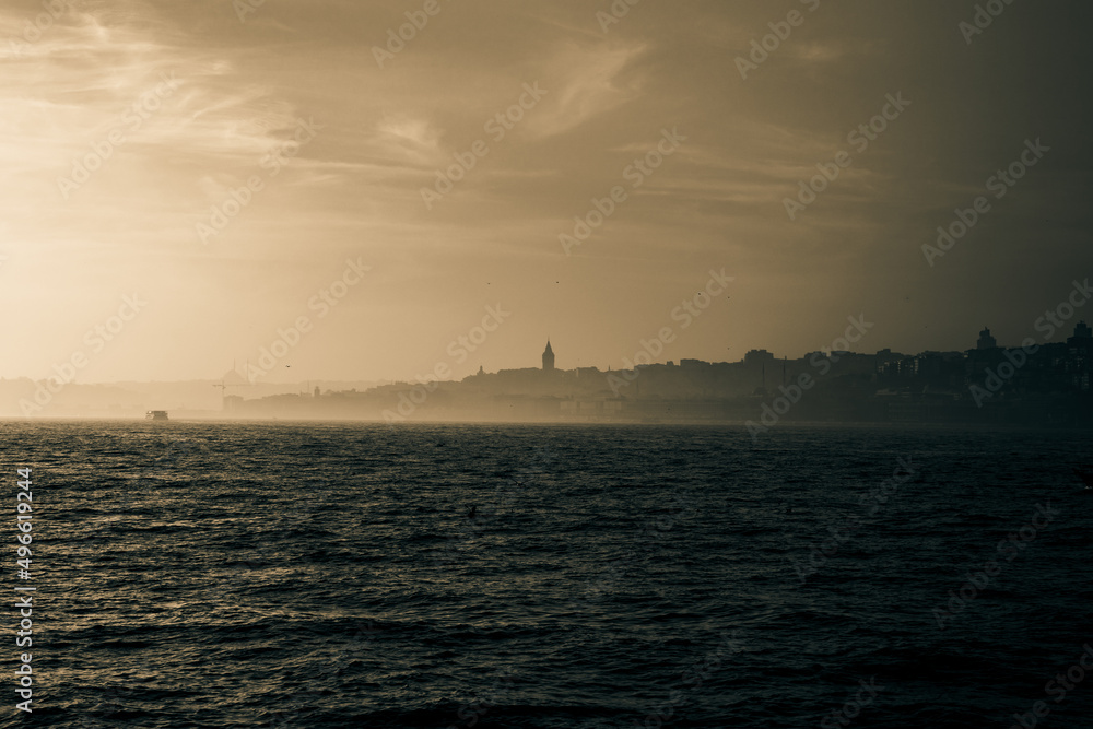 Moody Istanbul photo. Monochrome photo of cityscape of Istanbul at foggy weather