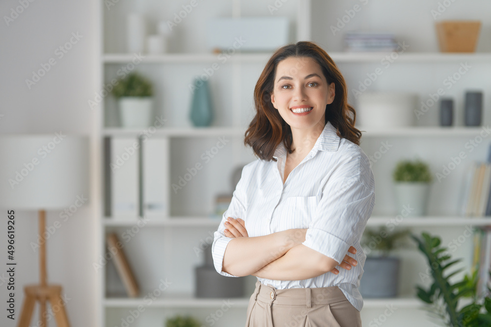 woman standing in the living room woman standing in the living room