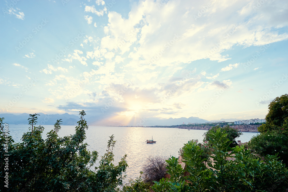 Beautiful landscape with sea bay, mountains and ship. Antalya, Turkey.