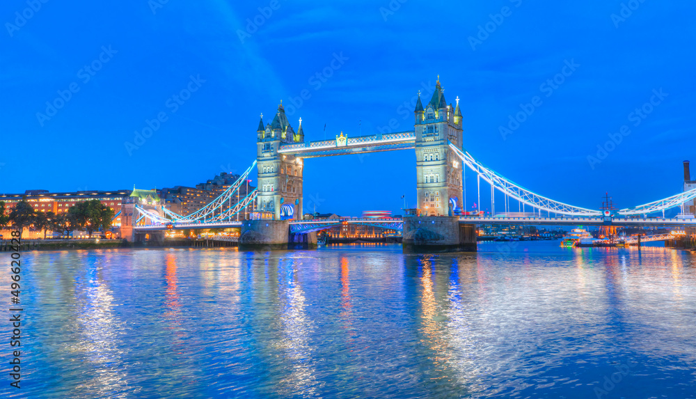 Panorama of the Tower Bridge on Thames river at twilight blue hour - London, United Kingdom