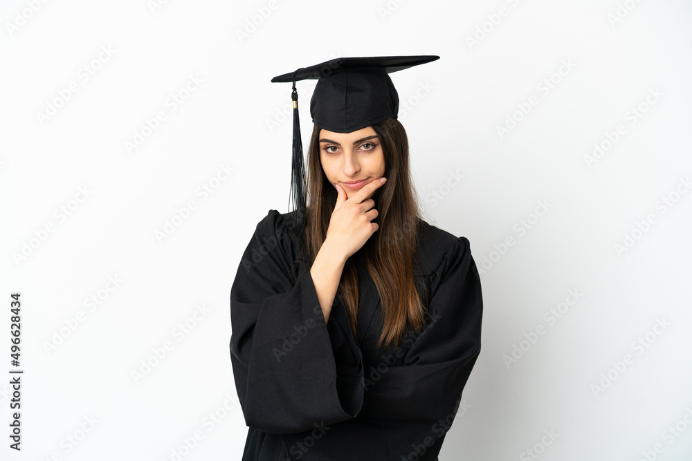 Young university graduate isolated on white background thinking Young university graduate isolated on white background thinking
