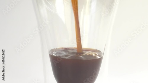 Preparation of cold espresso coffee with ice. photo