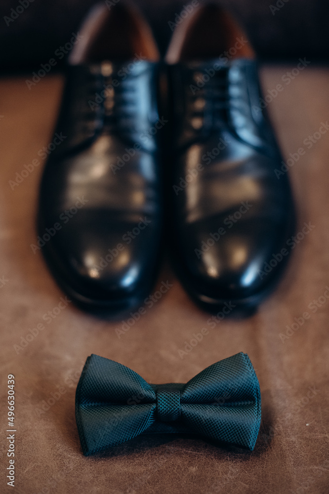 men's dress shoes and bow tie
