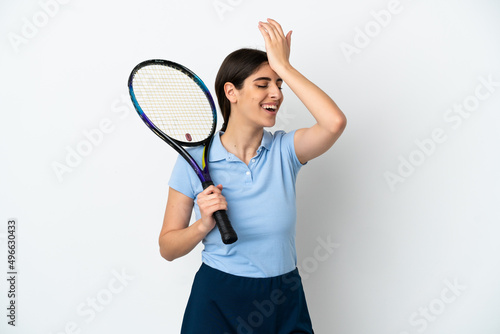 Handsome young tennis player caucasian woman isolated on white background has realized something and intending the solution