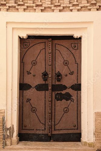 old wooden door in the city photo