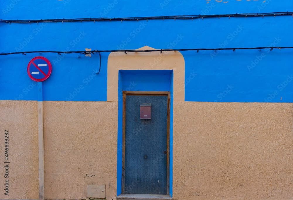 blue door in the street