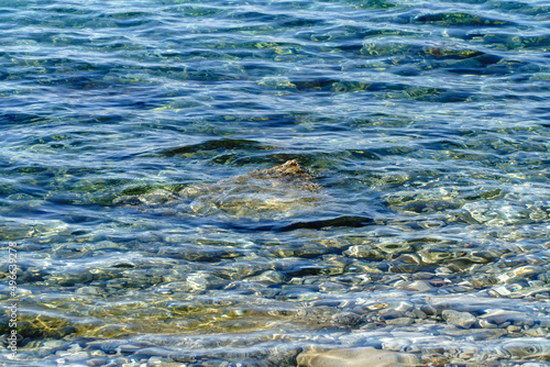 stone in the sea along the coast