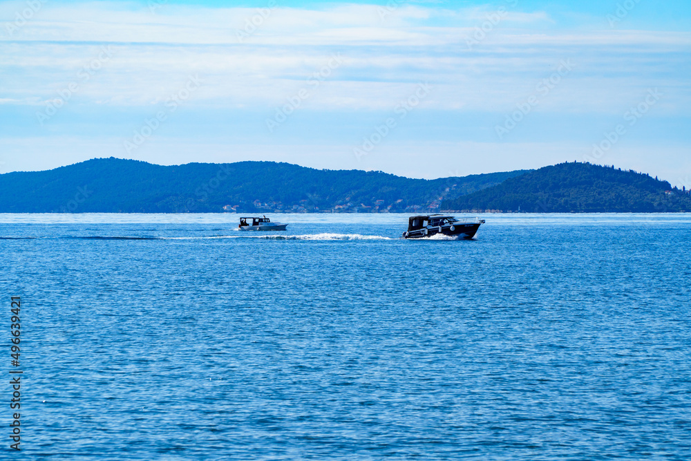 race two boats at sea