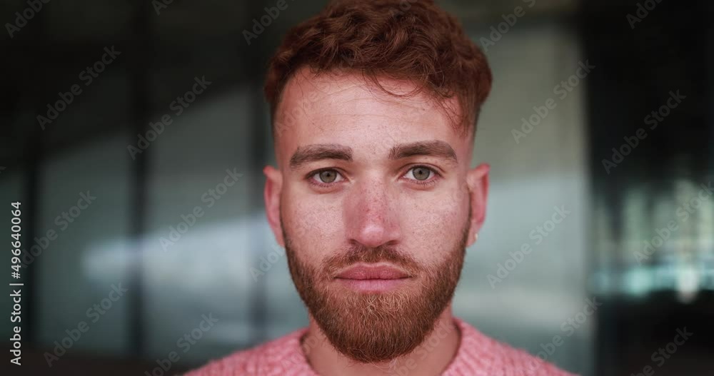 Young man looking on camera outdoor Young man looking on camera outdoor