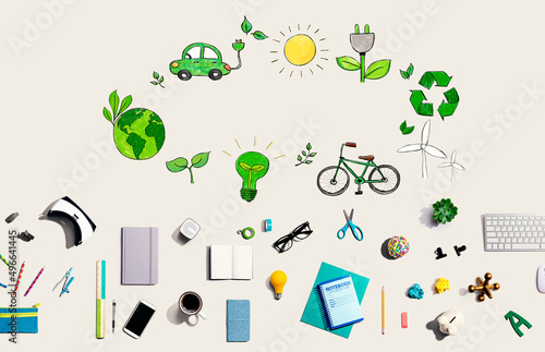 Eco theme with collection of electronic gadgets and office supplies