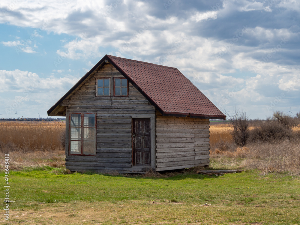 Abandoned log cabin in Bulgaria. Scenic landscape in the country. Abandoned log cabin in Bulgaria. Scenic landscape in the country.