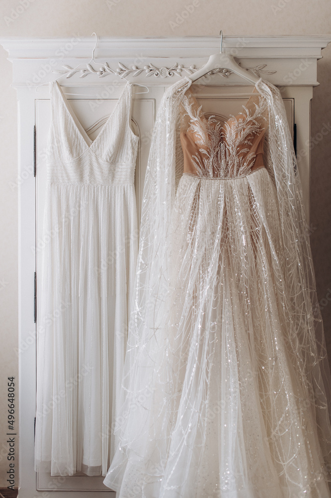 wedding dress hanging on closet door wedding dress hanging on closet door