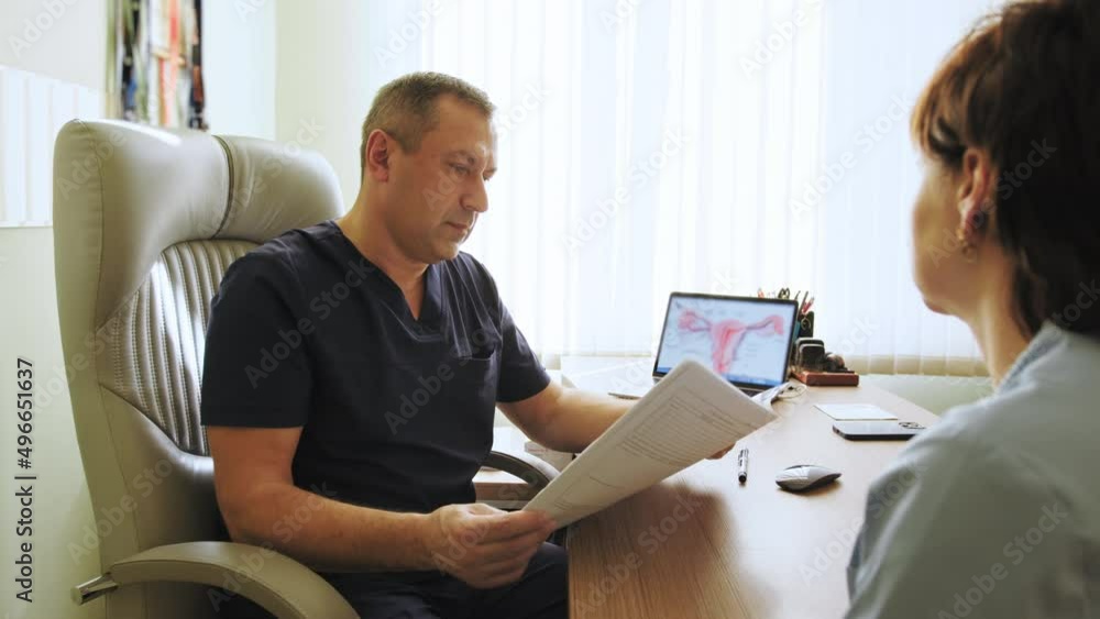 Handsome physician giving advice to patient on consultation in clinic. Health concept. Doctor having medical appointment with patient in hospital. Patients consulting with Experts in medical office. Handsome physician giving advice to patient on consultation in clinic. Health concept. Doctor having medical appointment with patient in hospital. Patients consulting with Experts in medical office.