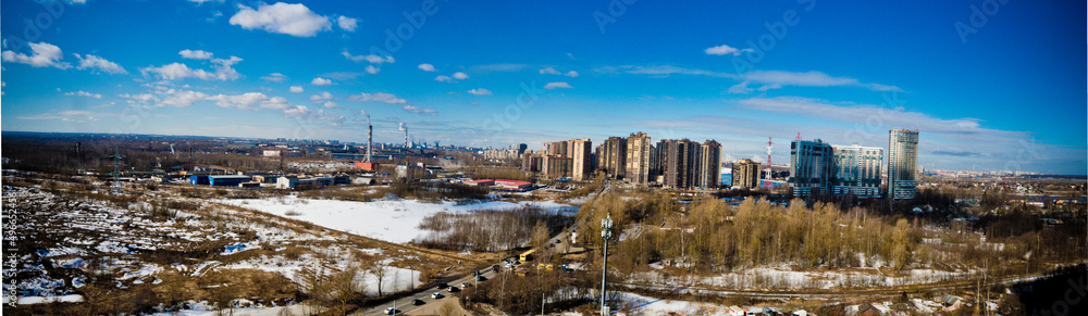 panorama of new buildings on the outskirts of the city against the sky close-up