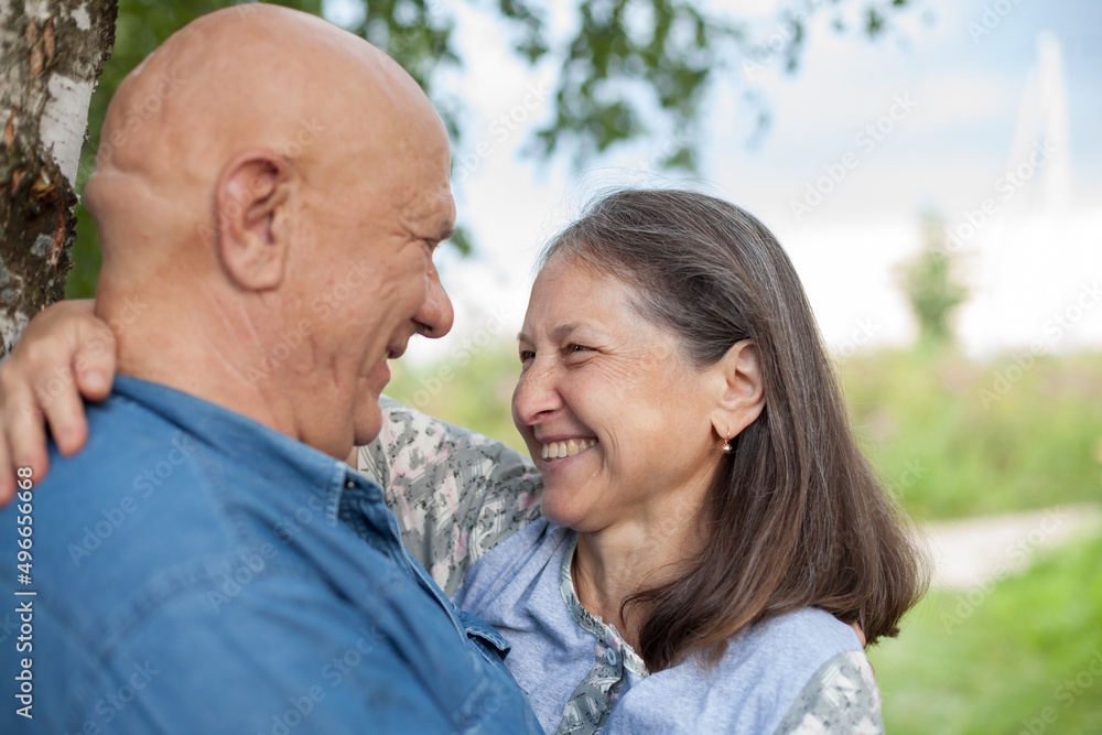 Portrait of caucasian senior couple in park Portrait of caucasian senior couple in park
