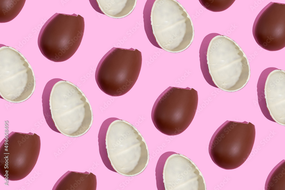 Chocolate eggs. Easter eggs. Seamless pattern of chocolate eggs on a pink background. Easter sweet chocolate background Chocolate eggs. Easter eggs. Seamless pattern of chocolate eggs on a pink background. Easter sweet chocolate background